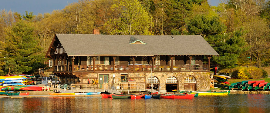 Photo of the historic boathouse in Newton where you can kayak from. by Paddle Boston Rentals